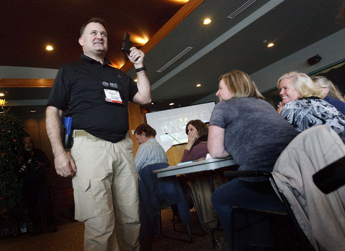 Leah Hogsten  |  Tribune file photo
Concealed firearms instructor Clark Aposhian kept the crowd entertained last December during the 6-hour during the OPSGEAR® and the Utah Shooting Sports Council's free Concealed Carry Weapons Class and Mass Violence Response Training at the Maverick Center. The class once again is being offered free to educators on Friday.