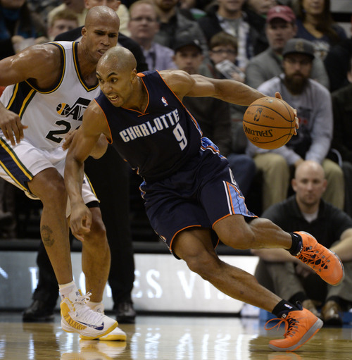 Rick Egan  | The Salt Lake Tribune 

Utah Jazz small forward Richard Jefferson (24) defends, as Charlotte Bobcats shooting guard Gerald Henderson (9) drives with the ball, in NBA action, Utah Jazz vs. The Charlotte Hornets, at the EnergySolutions Arena, Monday, December 30, 2013.,