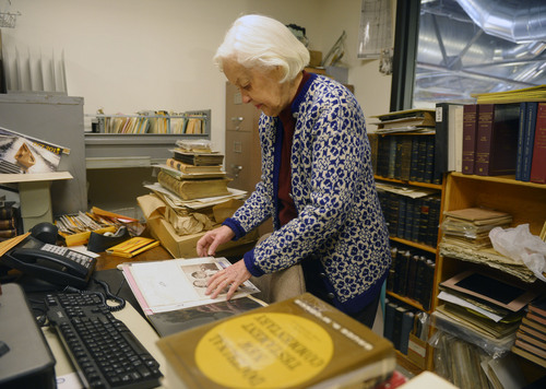 Steve Griffin  |  The Salt Lake Tribune

Lila Weller, 98, looks through photographs she is organizing at Weller Book Works in Trolley Square in Salt Lake City Monday, Dec. 30, 2013. Lila is the wife of Sam Weller and the "glue" that held the back end of the bookstore together according to daughter-in-law and current owner Catherine Weller. She returned to work at the family business after Sam died a few years ago. She works three days a week, cataloging archives and doing other assorted clerical tasks.