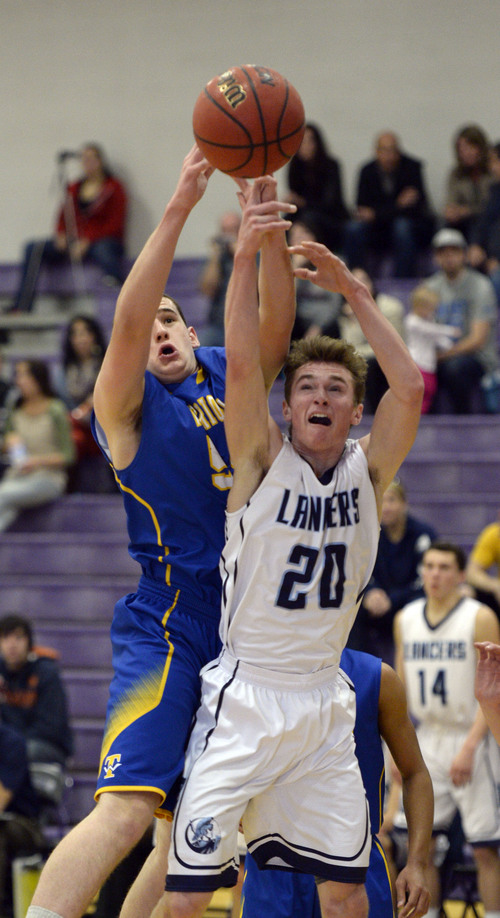 Francisco Kjolseth  |  The Salt Lake Tribune
Thomas Mackay of Taylorsville puts on the pressure as Caleb Harrop tries to take a shot in the Riverton Holiday Tourney at Riverton High school on Friday, Dec. 27, 2013.