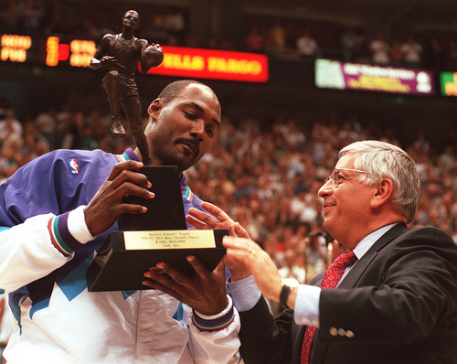 Tribune file photo

NBA commissioner David Stern presents Karl Malone the MVP trophy for the 1996-97 season.