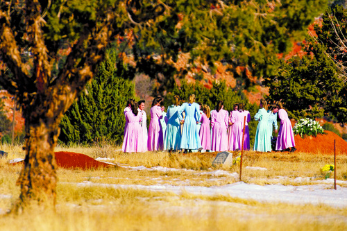 Trent Nelson  |  The Salt Lake Tribune
A group of women gathered in the city cemetery in Colorado City Sunday December 15, 2013.