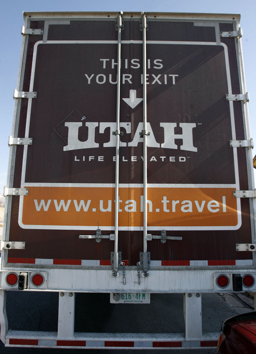 Utah's Office of Tourism's "Life Elevated" ads which include summer and winter photos on a semi, was parked outside of Utah Travel Council Hall, across from the capitol so that legislators and others around them could see how part of the state's tourism promotion funding is being spent.   Photo by Francisco Kjolseth/The Salt Lake Tribune 02/05/2007.
