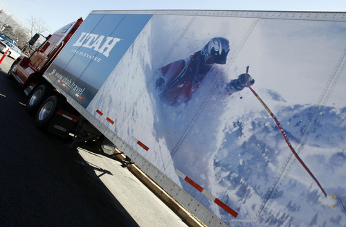 Utah's Office of Tourism's "Life Elevated" ads which include summer and winter photos on a semi, was parked outside of Utah Travel Council Hall, across from the capitol so that legislators and others around them could see how part of the state's tourism promotion funding is being spent.   Photo by Francisco Kjolseth/The Salt Lake Tribune 02/05/2007.
