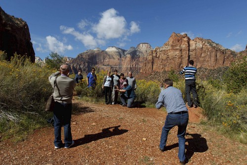 Trent Nelson  |  The Salt Lake Tribune
Visitors to Zion National Park take in the sights after the park opened on a limited basis Friday, October 11, 2013.