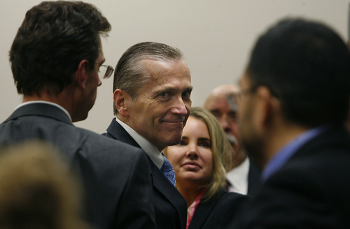 Scott Sommerdorf   |  The Salt Lake Tribune
Martin MacNeill thanks his defense team after he was found guilty of murder and obstruction of justice early Saturday morning, November 9, 2013.