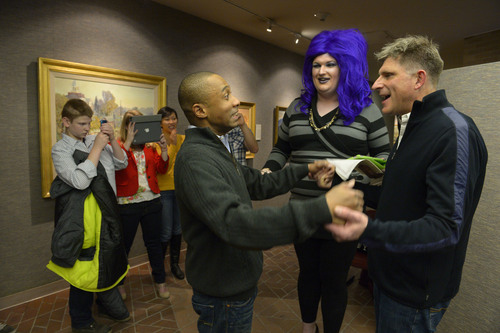 Francisco Kjolseth  |  The Salt Lake Tribune
Greg Jaboin, left, expresses his excitement uppon being declared married to his partner of 10-years, Steve Kachocki by officiant David Beach on Monday, Dec. 23, 2013, at the Salt Lake City County offices. Hundreds of same-sex couples descended on county clerk offices around the state of Utah on Monday, Dec. 22, 2013,  including the Salt Lake County office to request marriage licenses. A federal judge in Utah struck down the state's ban on same-sex marriage last Friday, saying the law violates the U.S. Constitution's guarantees of equal protection and due process.