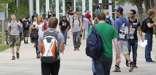 Al Hartmann  |  The Salt Lake Tribune
Students walk from the Shepherd Union building on the first day of the 2013 fall semester on the Weber State University campus Monday August 26.