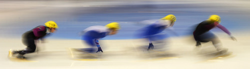 Steve Griffin  |  The Salt Lake Tribune


Skaters glide around a corner during the men's 1500-meter race in the 2014 U.S. Olympic Short Track Trials at the Utah Olympic Oval in Kearns, Friday, January 3, 2014.