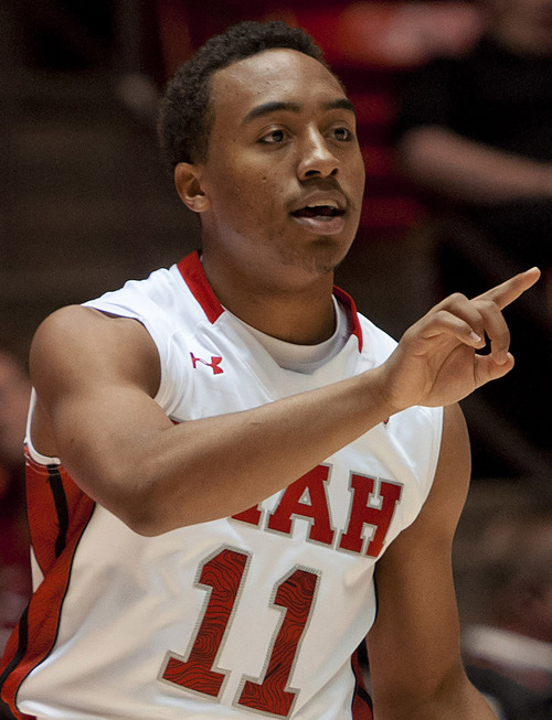 Michael Mangum  |  Special to the Tribune

Utah guard Brandon Taylor (11) calls an offensive play during their game against the Willamette Bearcats at the Huntsman Center on Friday, November 9, 2012. Utah led 52-22 after the first half.