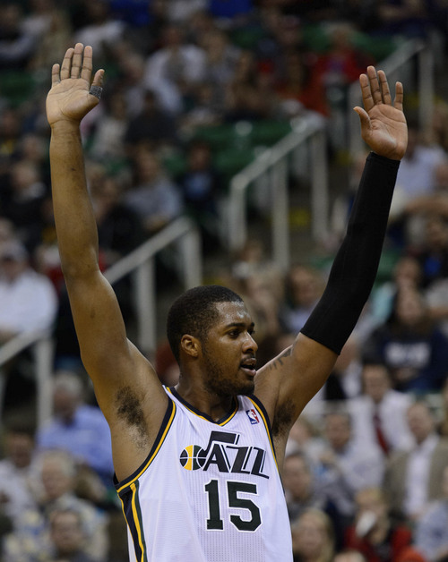 Trent Nelson  |  The Salt Lake Tribune
Utah Jazz power forward Derrick Favors (15) reacts to a foul as the Jazz face the New Orleans Pelicans, NBA basketball at EnergySolutions Arena in Salt Lake City, Wednesday November 13, 2013.