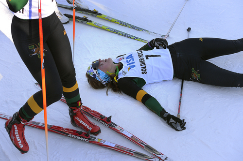 Scott Sommerdorf   |  The Salt Lake Tribune
Stephanie Kirk of the University of Vermont collapsed with exhaustion at the end of the Women's A Final at the U.S. Cross Country Ski Championships at Soldier Hollow, Sunday, January 5, 2014. Kirk finished 12th overall.