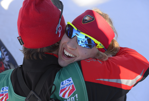 Scott Sommerdorf   |  The Salt Lake Tribune
Jennie Bender of The Bridger Ski Foundation in Bozeman, Mont., gets a hug from her coach after her win in the Women's A Final at the U.S. Cross Country Ski Championships at Soldier Hollow, Sunday, January 5, 2014.
