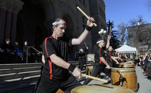 Al Hartmann  |  The Salt Lake Tribune
Members of the Japanese Kenshin Taiko drummers perform for crowd and new city  council members outside the City-County Building Monday January 6 in Salt Lake City.