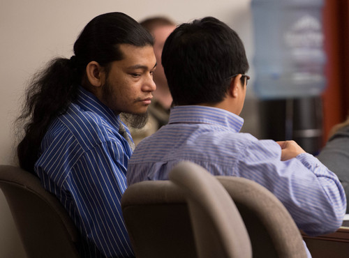 Trent Nelson  |  The Salt Lake Tribune
Esar met listens to a translator during his murder trial in Salt Lake City, Tuesday Jan. 7, 2014. Met is accused of killing 7-year-old Hser Ner Moo in 2008.