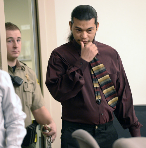 Al Hartmann  |  The Salt Lake Tribune
Esar Met enters Judge Judith Atherton's courtroom in Salt Lake City  Wednesday Jan. 8, 2014 for his murder trial. He accused of killing 7-year-old Hser Ner Moo, who disappeared on March 31, 2008.