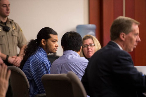 Trent Nelson  |  The Salt Lake Tribune
Esar Met, left, sits with his defense team and translator at the beginning of his murder trial in Salt Lake City, Tuesday Jan. 7, 2014. Met is accused of killing 7-year-old Hser Ner Moo in 2008.