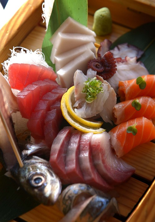 Leah Hogsten  |  The Salt Lake Tribune
Kobe Japanese Restaurant's sashimi boat with salmon, snapper, yellowtail, tuna, escolar, mackerel and octopus.