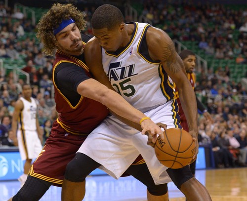 Leah Hogsten  |  The Salt Lake Tribune
Utah Jazz power forward Derrick Favors (15) pressures Cleveland Cavaliers center Anderson Varejao (17) during their matchup, Friday, January 10, 2014 at Energy Solutions Arena.