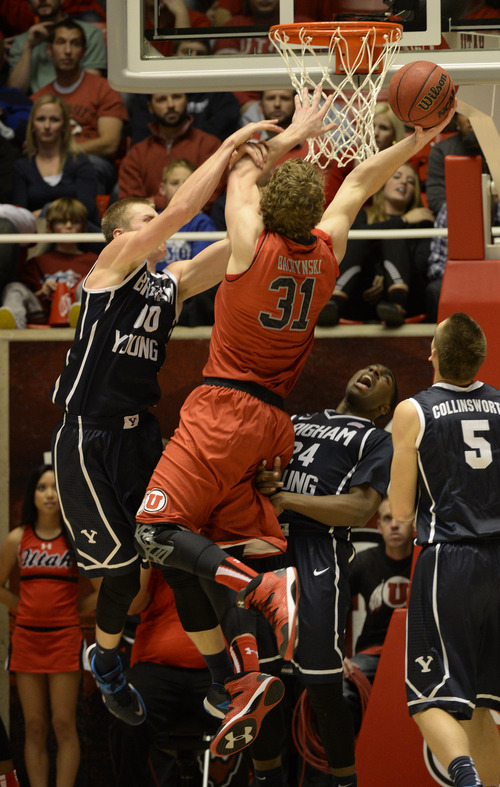 Rick Egan  | The Salt Lake Tribune 

Eric Mika was ejected from the game for  this flagrant foul on Utah Utes center Dallin Bachynski (31), in basketball action, at the Huntsman Center, Saturday, December 14, 2013.