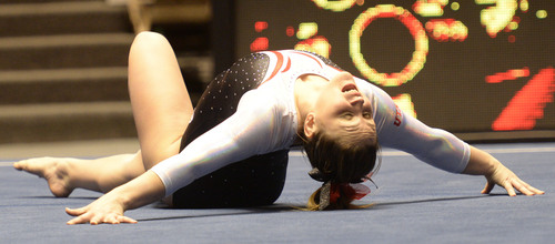 Rick Egan  | The Salt Lake Tribune 

Becky Tutka competes on the floor for the Utes, in their Gymnastics opener, Utah vs, BYU, Boise State and Southern Utah University,  at the Huntsman Center, Friday, January 10, 2014.
