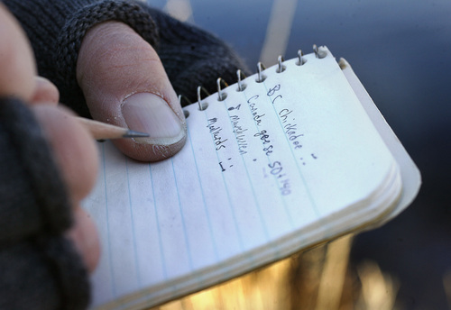 Scott Sommerdorf  |  The Salt Lake Tribune             
Birder Duane Smith records the birds he's spotted near Jordanelle Reservoir in a samll notebook during the 112th annual Audubon Christmas Bird Count. Counts are being held across the state, Saturday, December 17, 2011.