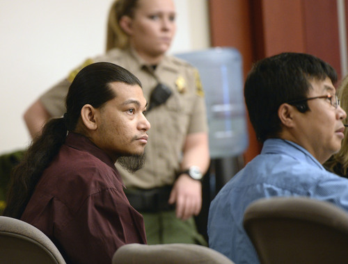 Al Hartmann  |  The Salt Lake Tribune
Esar Met, left, sits with his interpreter in Judge Judith Atherton's courtroom in Salt Lake City Tuesday January 14, 2014 for his murder trial. Esar Met is accused of killing 7-year-old Hser Ner Moo, who disappeared on March 31, 2008.