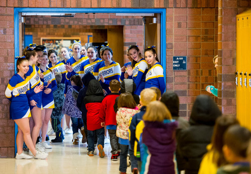 Trent Nelson  |  The Salt Lake Tribune
Members of the Taylorsville Cheer Squad welcome members of the class of 2026 (kindergarteners) to Taylorsville High School, Tuesday January 14, 2014. Hundreds of Taylorsville kindergarten students attended a rally at Taylorsville High School to see a variety of activities and opportunities available to students.