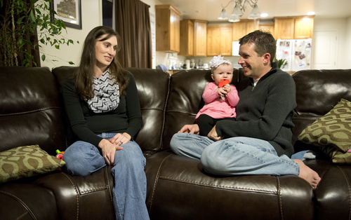 Jeremy Harmon  |  The Salt Lake Tribune

Ken Sullivan holds his 6-month-old daughter, Tana Sullivan, as his wife Becky talks about the prospects of him leaving to go to Mars in 2025.