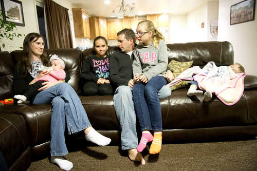 Jeremy Harmon  |  The Salt Lake Tribune

Ken Sullivan talks about the prospects of him going to Mars in 2025 while sitting with his family at their home in Farmington on Sunday, January 12, 2014. Seated with him are his wife Becky, 6-month-old daughter Tana, 12-year-old daughter Kaitlyn, 13-year-old daughter Jocelyn and 3-year-old son Kaunner.