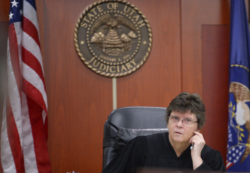 Steve Griffin  |  The Salt Lake Tribune

Judge Judith Atherton listens to attorneys during the trial of Esar Met at the Matheson Courthouse in Salt Lake City, Thursday, January 16, 2014. Met is on trial for allegedly kidnapping, sexually assaulting and killing 7-year-old Hser Ner Moo, who disappeared March 31, 2008.