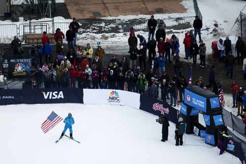 JIM MCAULEY | The Salt Lake Tribune
Olympian and men's ski coach Clint Jones delivered the American flag on skis before the US Olympic Trials for Nordic Combined ski jumping ahead of the 2014 Sochi Winter Games at the Utah Olympic Park in Park City, Utah.