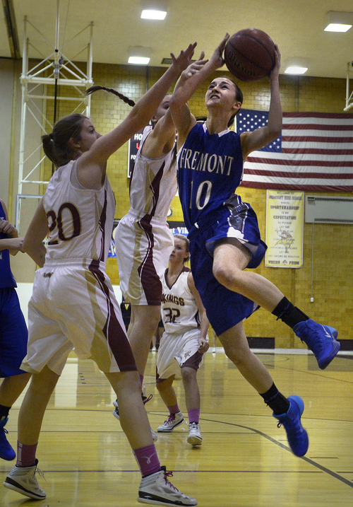 Scott Sommerdorf   |  The Salt Lake Tribune
Shelbee Molen goes up for two of her 19 points against Viewmont's Sky Fenwick as Fremont beat Viewmont 67-47, Friday, January 10, 2014.