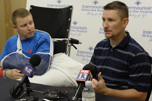 Rick Egan  | The Salt Lake Tribune 

Matt Morgan (left) listens as his friend, Justin Hildreth talks about the avalanche Morgan, survived last Saturday, near the Idaho-Utah border, during a press conference at the McKay-Dee Hospital, Wednesday, January 15, 2014.