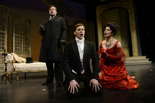 Francisco Kjolseth  |  The Salt Lake Tribune
Singers James Westman (Germont), Cody Austin (Alfredo) and Sara Gartland (Violetta), from left, perform a scene from Utah Opera's "La Traviata," Verdi's hit show about the courtesan with a heart of gold, her impetuous boyfriend and his meddling dad.