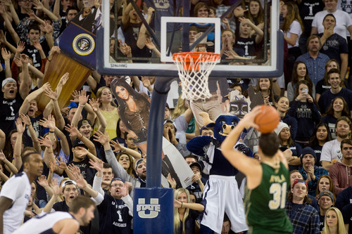 Trent Nelson  |  The Salt Lake Tribune
Utah State fans try to distract Colorado State Rams forward J.J. Avila (31) as Utah State University hosts Colorado State, NCAA basketball, Wednesday January 15, 2014 in Logan.