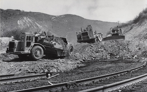 Tribune file photo
Heavy equipmentin 1983 works in the slide area on scenic loop above Gilluly in Spanish Fork Canyon, about 5 mile west of Soldiers Summit.