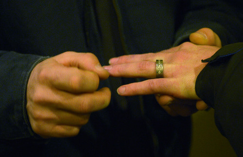 Steve Griffin  |  The Salt Lake Tribune


Kristan Frahm, of Clinton places a wedding ring on the finger of her wife, Rachel Frahm, as they are married at the Hampton Inn Suites in Ogden, Utah Monday, December 23, 2013. Volunteer clergy were performing marriage ceremonies for couples across the street from the Weber County Clerk's Office in downtown Ogden.
