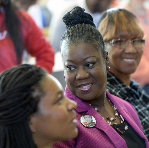 Al Hartmann  |  The Salt Lake Tribune 
Sybrina Fulton, Trayvon Martin's mother, smiles as she is introduced to a packed ballroom at the University of Utah on Thursday. Since the 17-year-old Martin's 2012 death, she's traveled the country raising awareness about racial profiling.