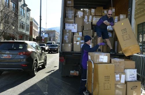 Scott Sommerdorf   |  The Salt Lake Tribune
FedEx delivery team deliver packages for the Sundance Film Fesival on Main Street in Park City, Wednesday, January 15, 2014.