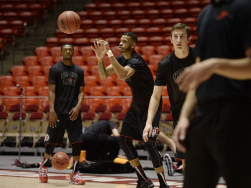 Francisco Kjolseth  |  The Salt Lake Tribune
The University of Utah basketball team begins their pre-game warm up as they get ready to take on the USC Trojans at the Huntsman Center on the University of Utah campus on Thursday, Jan. 16, 2014.