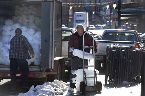 Scott Sommerdorf   |  The Salt Lake Tribune
Workers deliver ice to a restaurant on Main Street in Park City, Wednesday, January 15, 2014.
