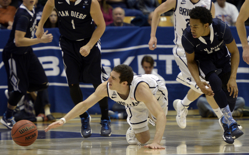 Rick Egan  | The Salt Lake Tribune 

Brigham Young Cougars guard Matt Carlino (2) goes for a loose ball, in basketball action,  BYU vs. The San Diego Toreros at the Marriott Center,  Saturday, January 4, 2014.