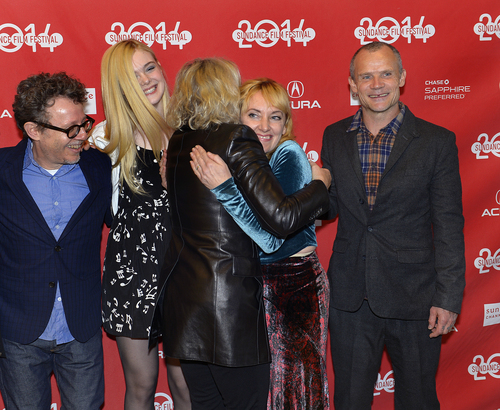 Scott Sommerdorf   |  The Salt Lake Tribune
Director Jeff Preiss, Elle Fanning, and Flea, far right, watch as Glenn Close hugs co-writer Amy-Jo Albany as they meet on the red carpet for "Low Down," about the torrid, true life story of jazz pianist Joe Albany, at the Eccles Theater, Sunday, January 19, 2014. The cast includes John Hawkes, Elle Fanning, Glenn Close, Peter Dinklage, Lena Headey and Flea; The film is part of the U.S. Dramatic Competition program.