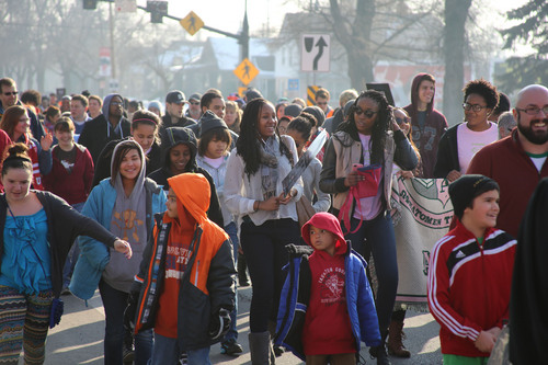 Francisco Kjolseth  |  The Salt Lake Tribune
University of Utah students and members of the community march 1.3 miles from East High School to Kingsbury Hall in honor of MLK day. Donations accepted at the end of the March for Youth go toward the Rev. France Davis Scholarship Fund.