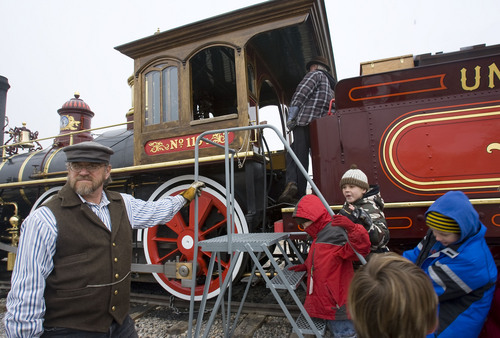 Al Hartmann  |  The Salt Lake Tribune
Union Pacific steam locomotive 199 engineer Ron Wilson gives tours of the the engine's cab at Golden Spike National Historic Site visitor center in northwestern Utah Wednesday December 28.   Golden Spike holds its annual Winter Steam Festival on December 28-30 Folks can get up close to tour the locomotive cab, see steam demonstrations as well as take a ride on a muscle powered handcart.