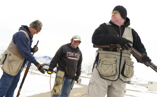 Leah Hogsten  |  The Salt Lake Tribune
l-r Danny Bush, Ed Wehking and Dan O'Toole share a laugh while breaking clays at the Lee Kay Center Range in West Valley City, Saturday, January 11, 2014.The National Shooting Sports Foundation is releasing a report on the economic value of target shooting in Utah and the United States.