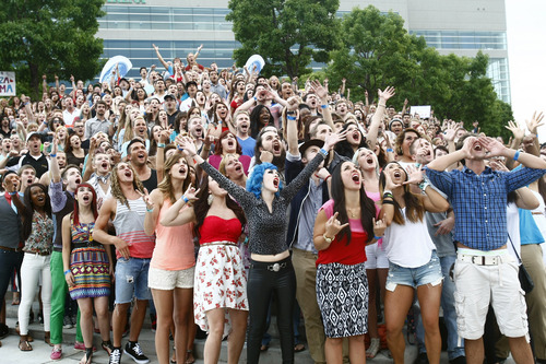 Chris Detrick  |  The Salt Lake Tribune
People about to audition for "American Idol" cheer outside of EnergySolutions Arena in July.