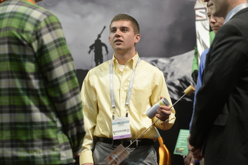 Rick Egan  | The Salt Lake Tribune 

Jeff Larsen, Salomon (left) listens as Tanner Harrison talks about the Wolf em Stick, made by he and his brother, Spencer Harrison, as they tour the Outdoor Retailers Convention, along with Salt Lake County Mayor Ben McAdams, at the Salt Palace, Thursday, January 23, 2014.