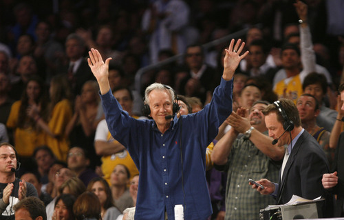Los Angeles -  Utah Jazz radio announcer Hot Rod Hundley waves to a cheering crowd as his retirement is announced during second half action of game 5 of the Jazz Lakers NBA playoffs at the Staples Center in Los Angeles Monday Apr 27, 2009.  Steve Griffin/The Salt Lake Tribune 4/27/09